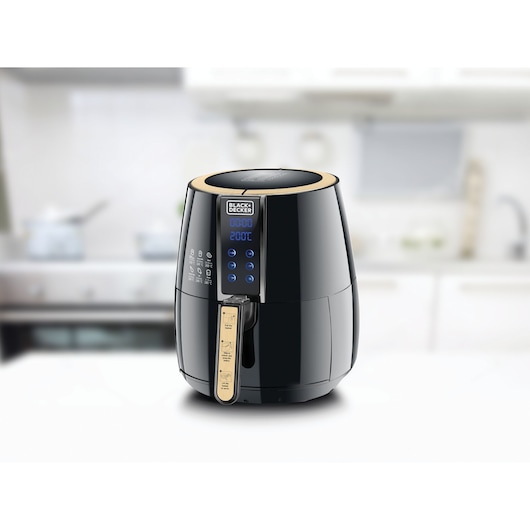 BLACKDECKER AF400 digital air fryer with gold trim on kitchen counter, front angle.