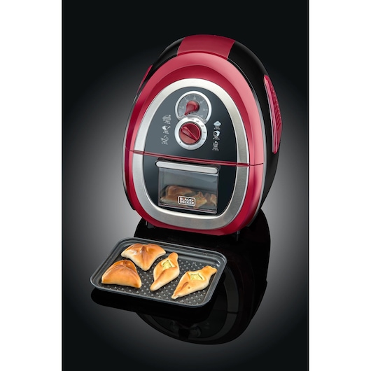 BLACK+DECKER AF500 air fryer with red and black finish, tray of baked pastries in front, front angle.