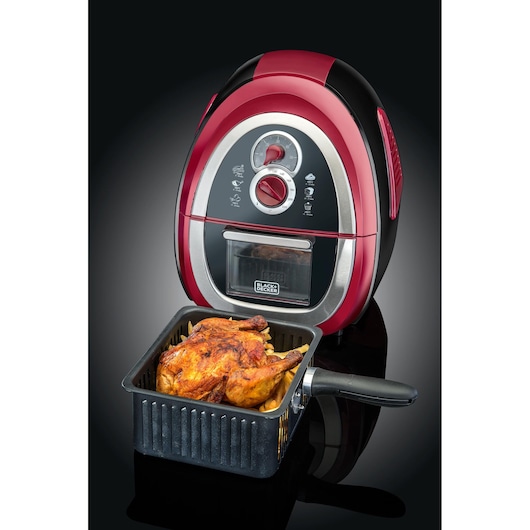 BLACKDECKER AF500 red and black air fryer with roast chicken in basket, front angle.