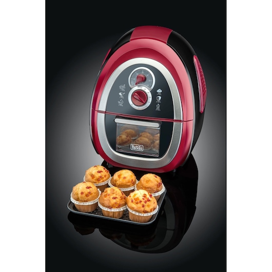 Photo of BLACKDECKER AF500 air fryer in red and black with muffins in front, straight-on angle.