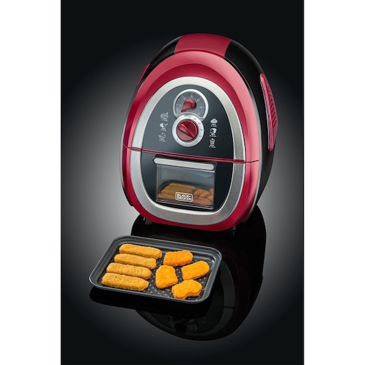 Photo of BLACK+DECKER AF500 red and black air fryer with control dials, tray of breaded snacks in front, angled view.