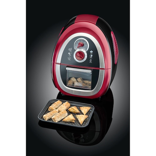 BLACK+DECKER AF500 air fryer, red and black, front angle, with a tray of cooked pastries.