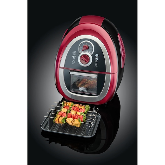 BLACK+DECKER AF500 red and black air fryer with control dials and skewered grilled food on tray, front angle.