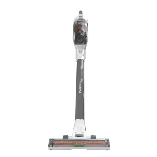 Front view of a BLACK+DECKER cordless stick vacuum cleaner with a long handle, transparent dust container, and motorized brush head, standing upright on a white background.