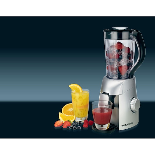 Photo of BLACK+DECKER BS600 blender with clear jar, mixed berries and ice, two glasses of juice, and assorted fruits.