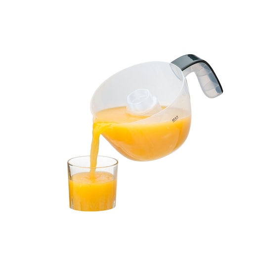 Photo of BLACKDECKER CJ200 juicer pitcher pouring orange juice into a glass, side angle.