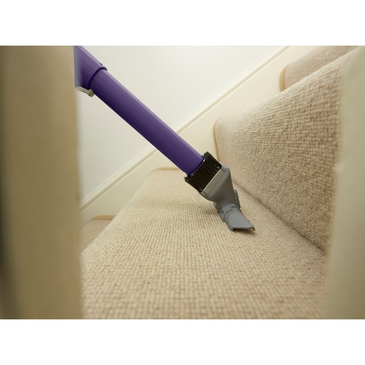 BLACKDECKER CUA525BHP vacuum cleaner nozzle cleaning carpeted stairs.