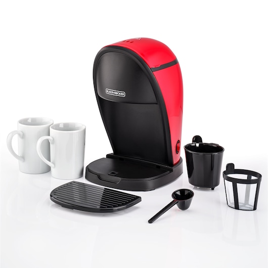 A BLACK+DECKER red and black single-serve coffee maker, shown with two white mugs, a black drip tray, a coffee scoop, a filter basket, and a mesh filter on a white background.