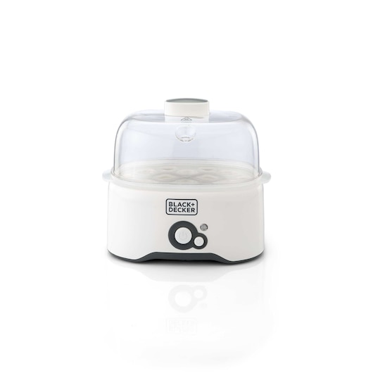 A BLACK+DECKER branded egg cooker with a white base and a transparent lid, designed for cooking eggs, shown against a plain white background.