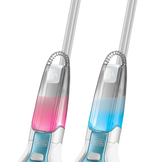 Close-up of two BLACK+DECKER steam mops with transparent tanks, one filled with pink liquid and the other with blue liquid.