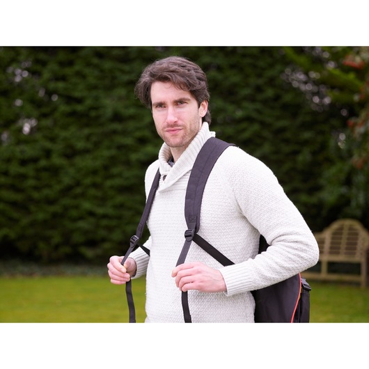 BLACKDECKER GW3031BP photography of person outdoors wearing a white sweater and black backpack.