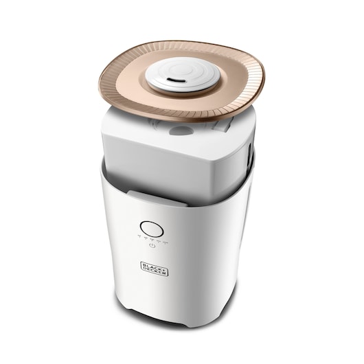 BLACKDECKER HM4000 countertop appliance with round beige tray, front angle photography.
