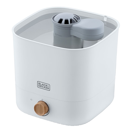 BLACK+DECKER HM4125 white humidifier with wood-effect control knob, photography of angled front view on white background.