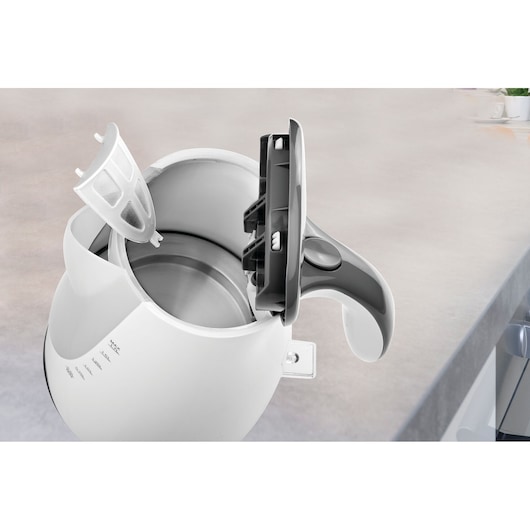 BLACKDECKER JC72 electric kettle with open lid and removable filter, shown on kitchen counter, top angle.