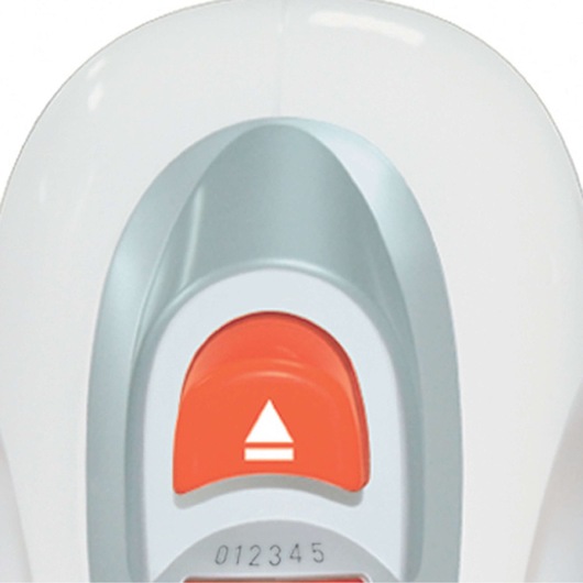 Close-up view of a white and grey device with a prominent orange button featuring a white triangular arrow symbol. The numbers 0 to 5 are visible below the button, indicating adjustable settings. The product appears to be an electronic household appliance.