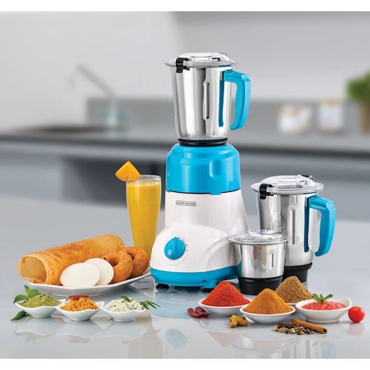 BLACK+DECKER MG550 mixer grinder with three stainless steel jars in blue and white, displayed with food and spices on kitchen counter.