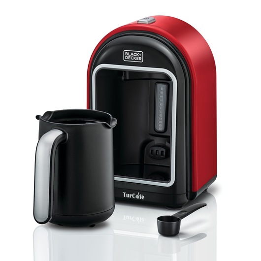 BLACKDECKER TCM700 red coffee maker with black carafe and measuring spoon, front angle, white background.