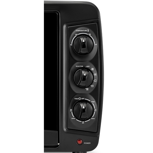 BLACKDECKER TRO35RDG oven control panel with three black knobs for temperature, function, and timer, front angle.
