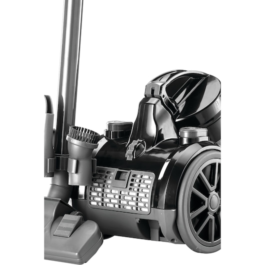 BLACK+DECKER VM1480 canister vacuum cleaner, black finish, side angle, visible brush attachment and wheels.