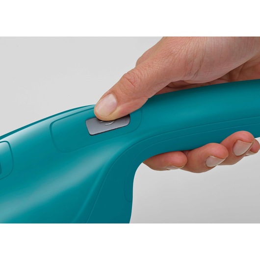 Photo of BLACKDECKER WDB115WA handheld vacuum handle with thumb pressing the power button.