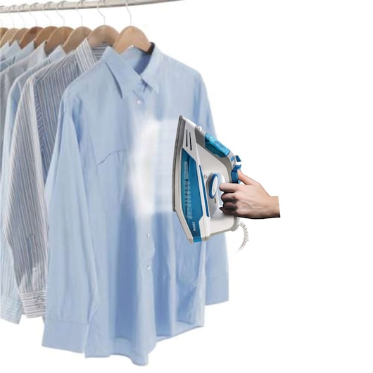 BLACKDECKER X2800 steam iron in use on light blue shirt, shirts hanging on rack, side angle