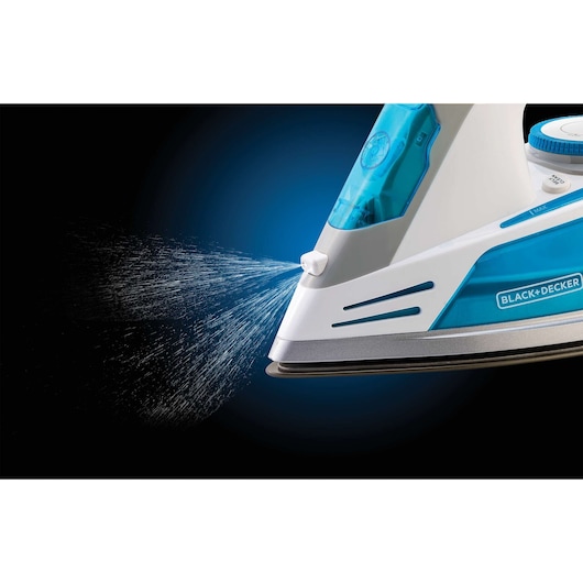 Photo of BLACK+DECKER X2800 steam iron spraying water, close-up side angle, blue and white design.